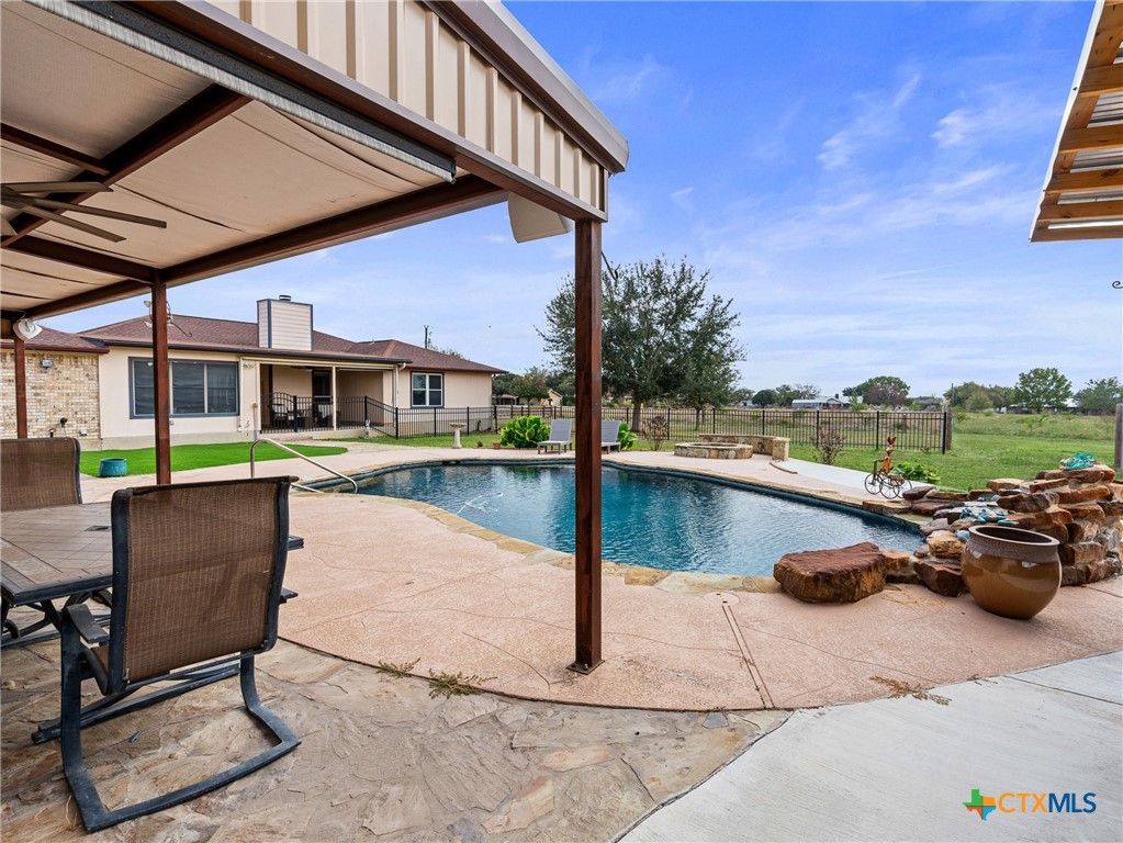 782 Santa Clara Loop Marion, TX 78124 - Photo 19 of 48 a view of a lake with couches and wooden floor