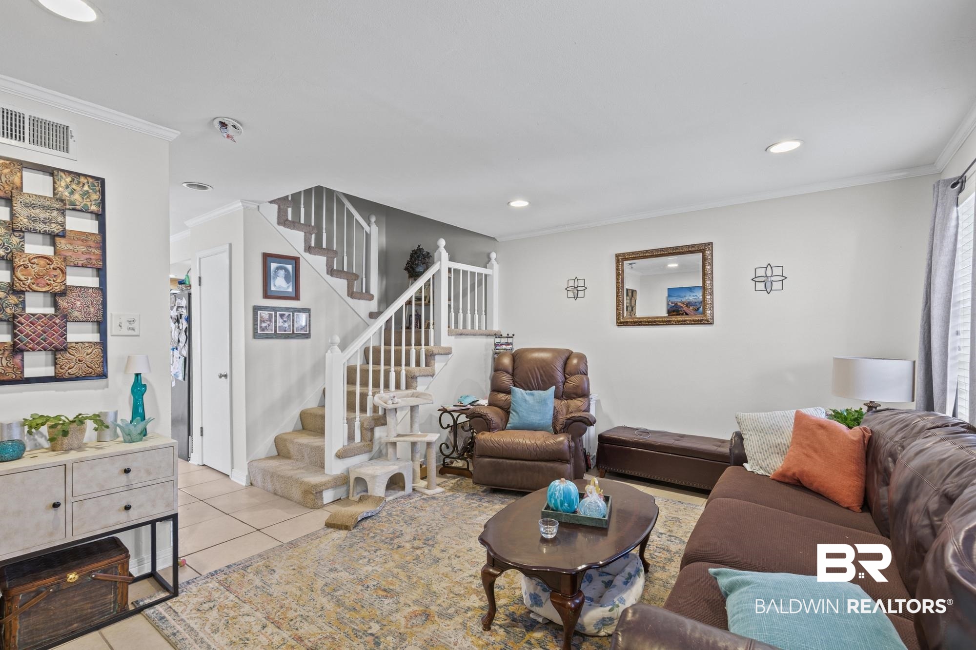 114 Du Rhu Drive, Unit A Mobile, AL 36608 - Photo 2 of 14 Living room featuring ornamental molding, light tile patterned flooring, and recessed lighting