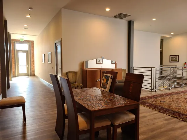 a view of a dining room with furniture