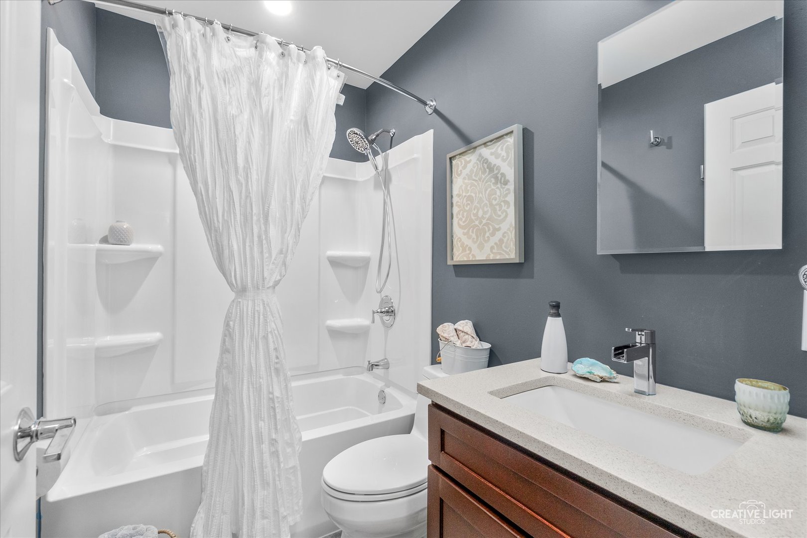 14050 Townhouse Road Newark, IL 60541 - Photo 21 of 45 a bathroom with a sink a toilet and shower
