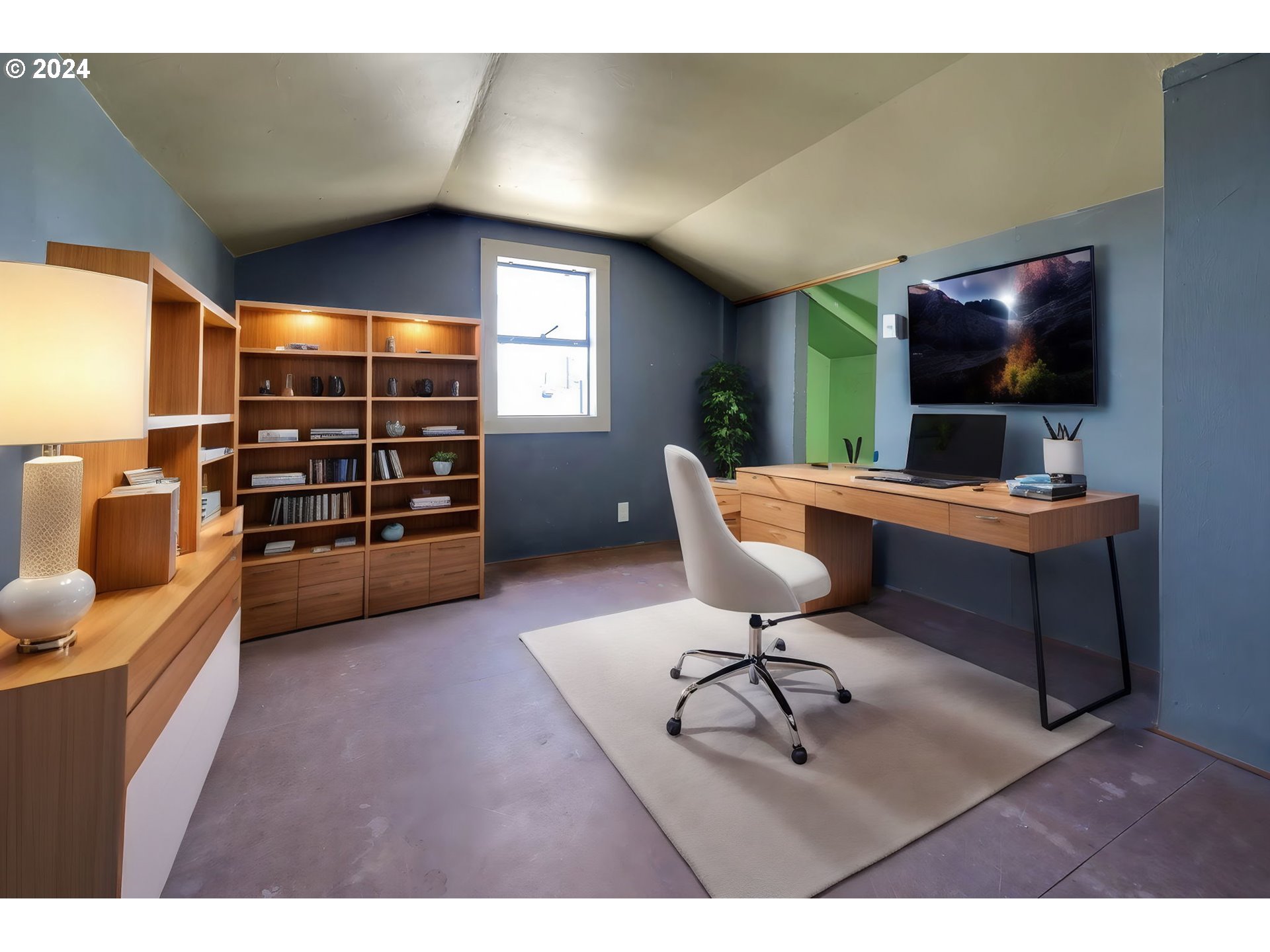 1325 Modoc Street Springfield, OR 97477 - Photo 16 of 36 a workspace with furniture and a flat screen tv