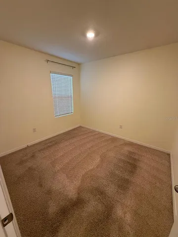 an empty room with a natural light
