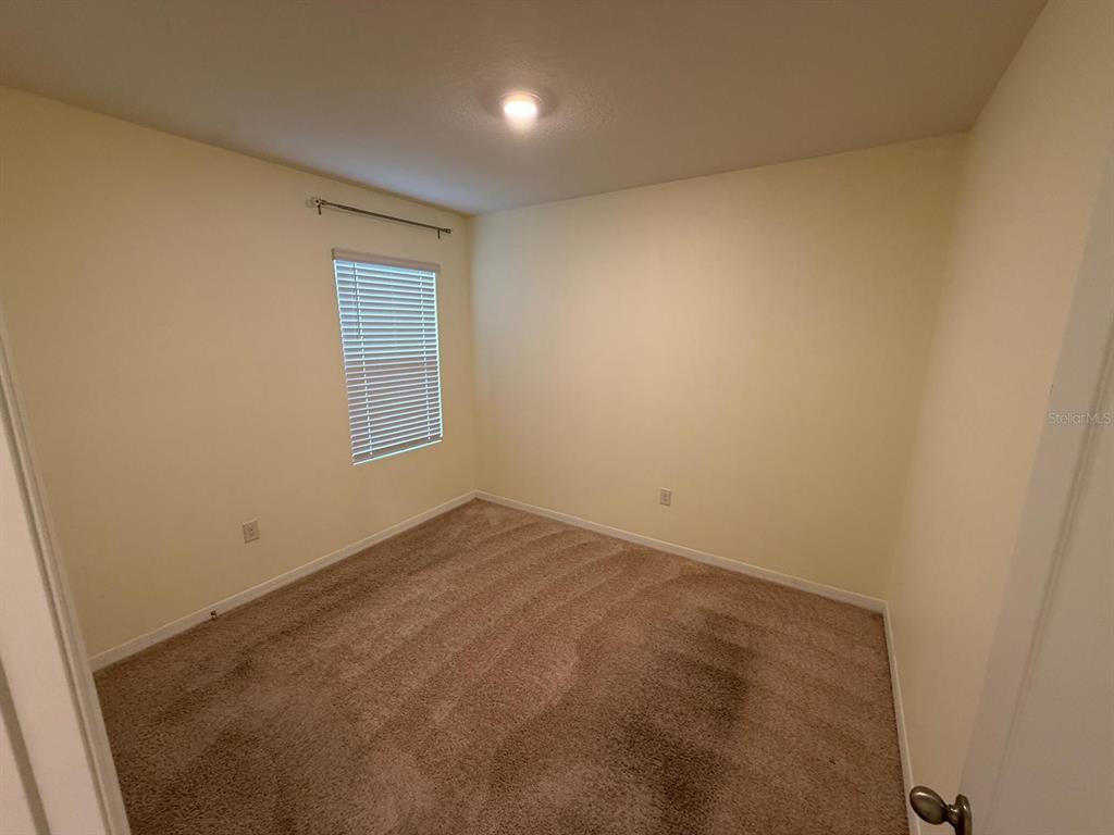 2617 Harmonia Hammock Road Harmony, FL 34773 - Photo 27 of 36 an empty room with windows