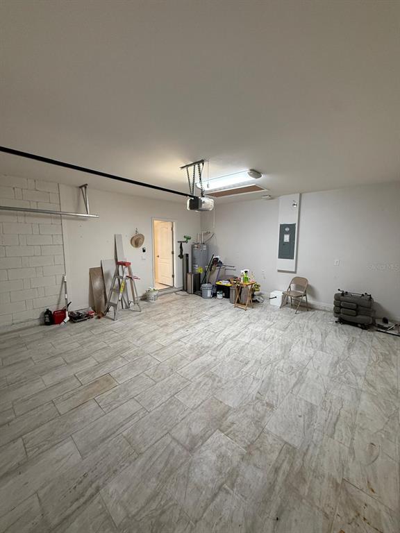 2617 Harmonia Hammock Road Harmony, FL 34773 - Photo 33 of 36 a view of a room with gym equipment