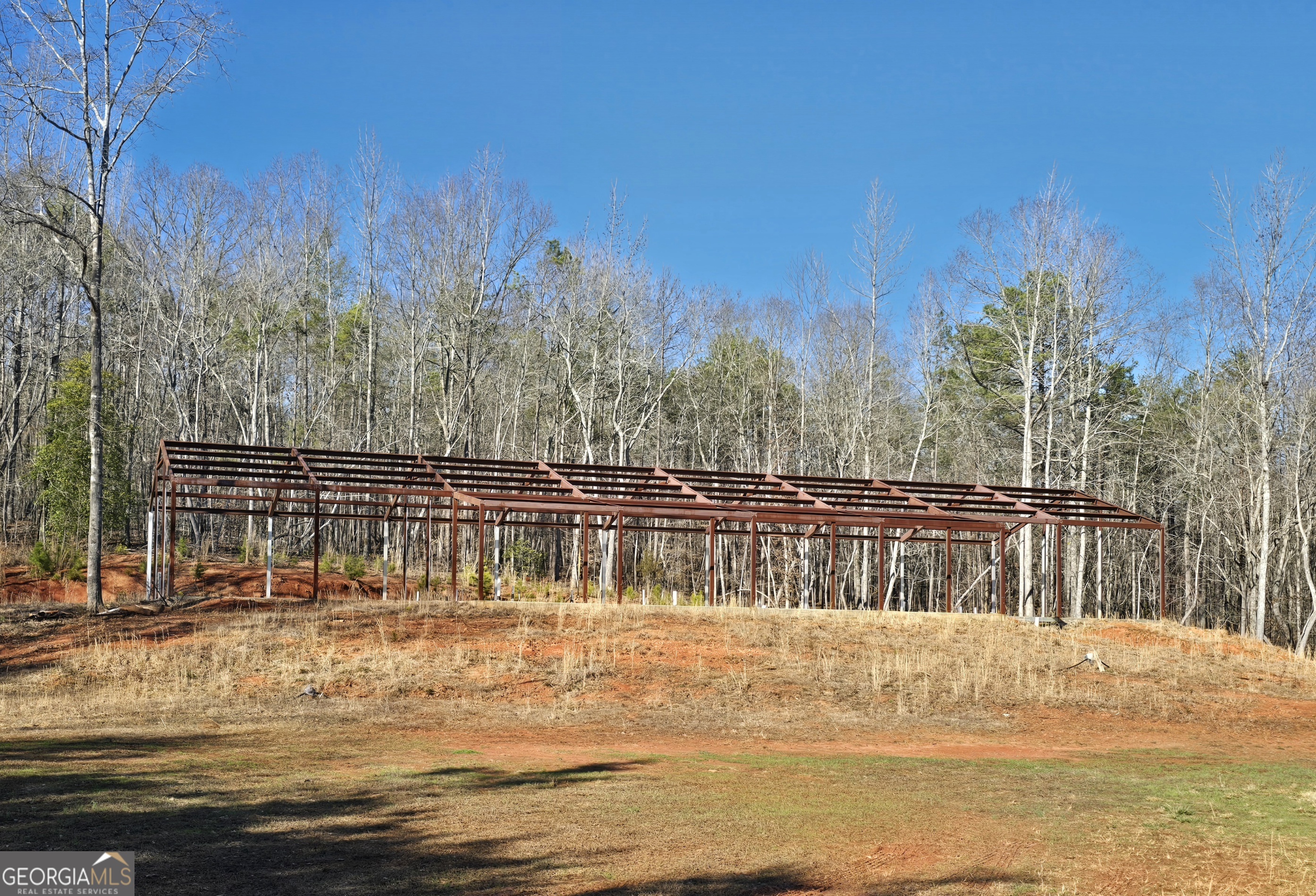1183 Wilson Bridge Road Homer, GA 30547 - Photo 2 of 23 a view of a swimming pool with an outdoor space