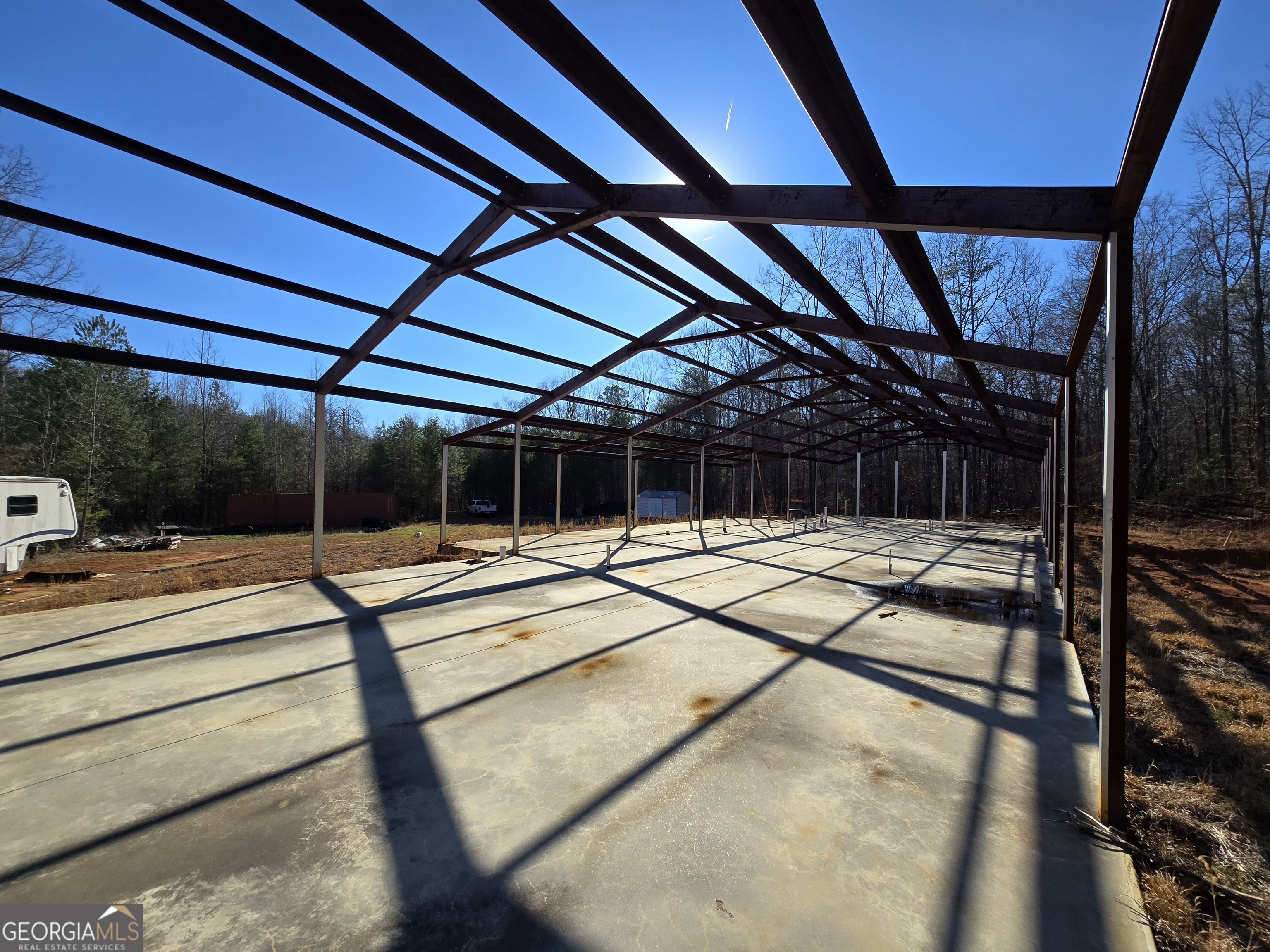 1183 Wilson Bridge Road Homer, GA 30547 - Photo 7 of 23 a view of a swimming pool with a patio