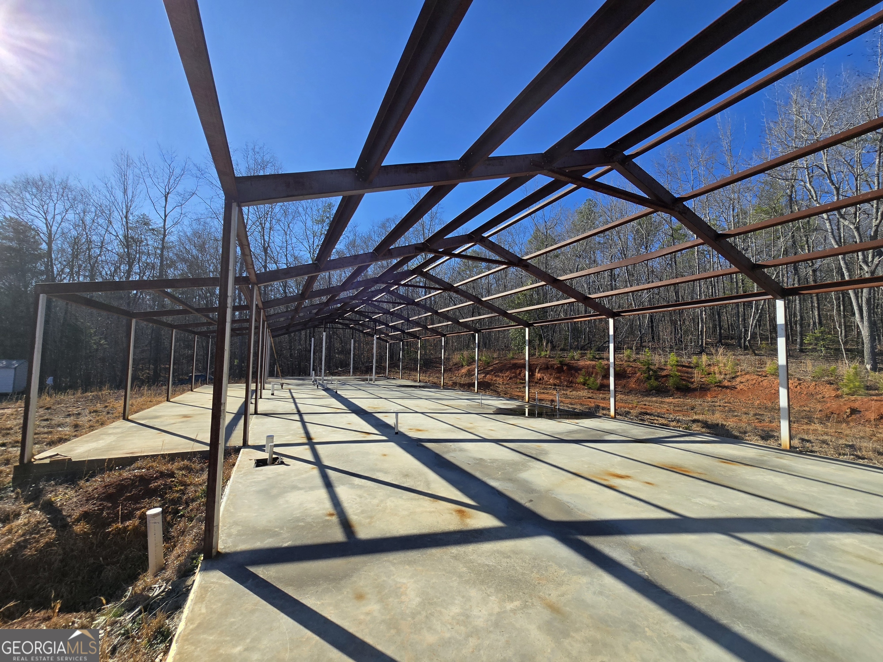1183 Wilson Bridge Road Homer, GA 30547 - Photo 9 of 23 a view of a swimming pool with a patio
