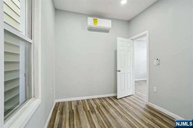 127 Randolph Avenue, Unit 2 Jersey City, NJ 07305 - Photo 11 of 17 a view of wooden floor