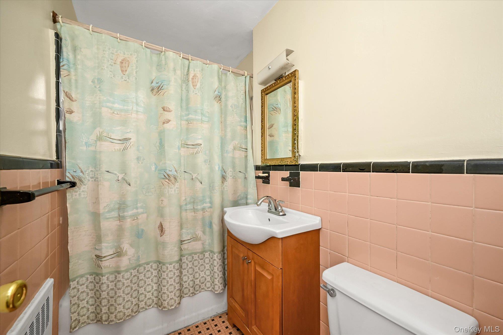 16-01 160th Street, Unit 6279 Queens, NY 11357 - Photo 11 of 17 a bathroom with a sink a toilet and shower