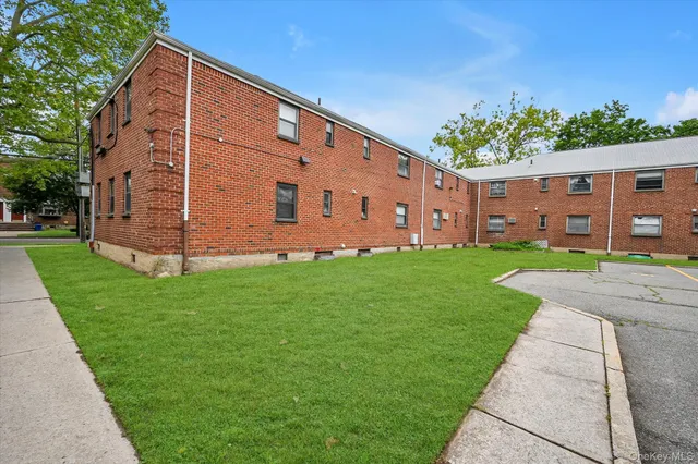 a front view of house with garden