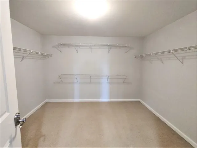 a view of a room with racks on the wall