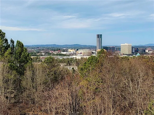 a view of a city with tall buildings