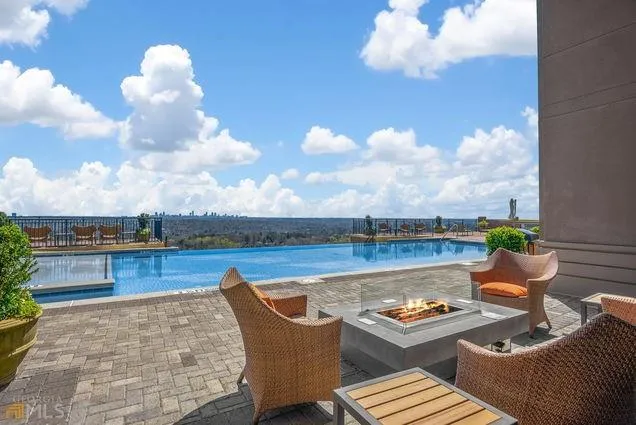 a view of a terrace with furniture