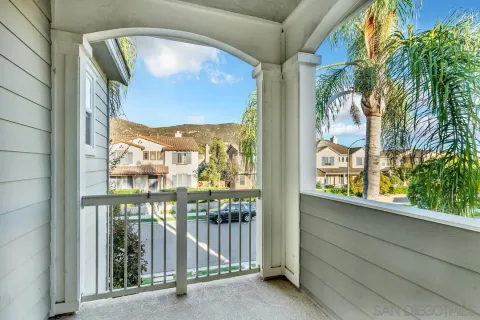 a view of a balcony with an outdoor space