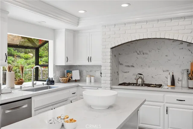 a living room with fireplace furniture and a flat screen tv