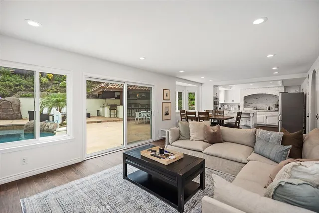 a view of a swimming pool with a yard