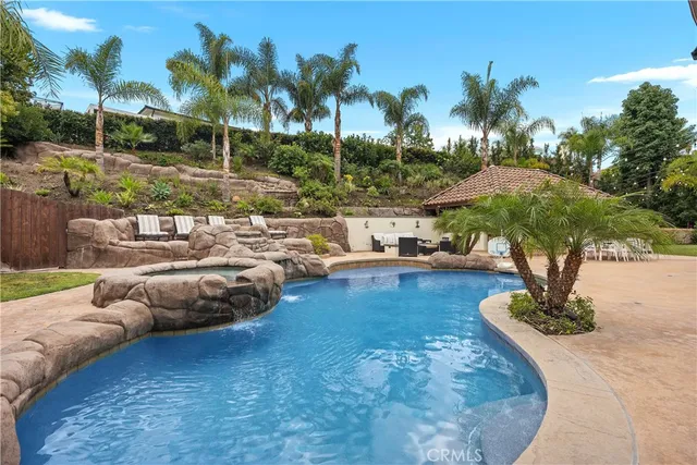 a open kitchen with stainless steel appliances granite countertop a stove and a sink