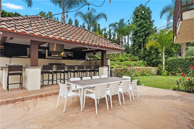 a bedroom with a bed and a table