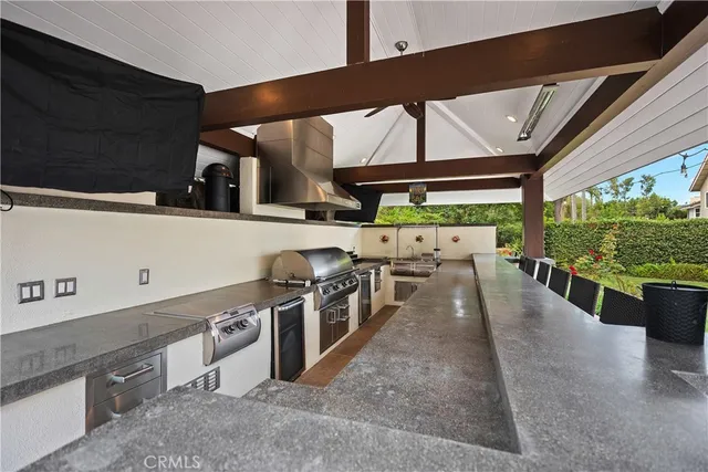 a bathroom with double vanity sink and a mirror