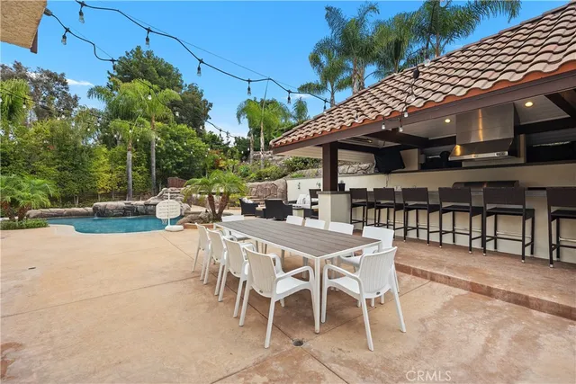 a spacious bedroom with a bed and a window