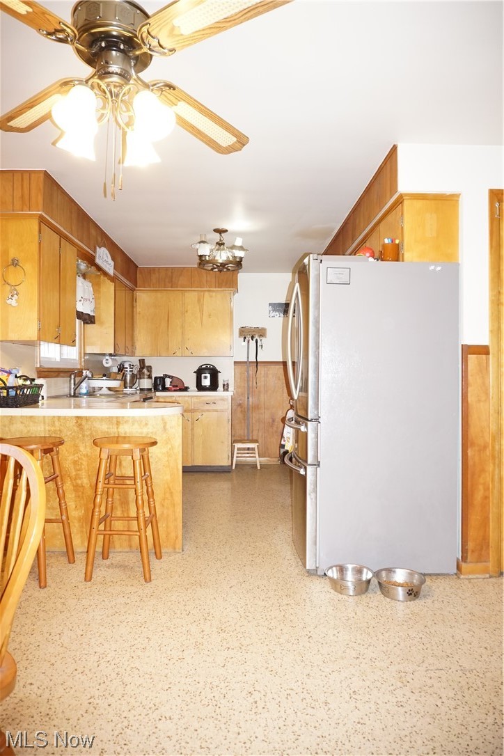 4611 8th Street Northwest Canton, OH 44708 - Photo 10 of 29 Kitchen with sink, ceiling fan, and refrigerator