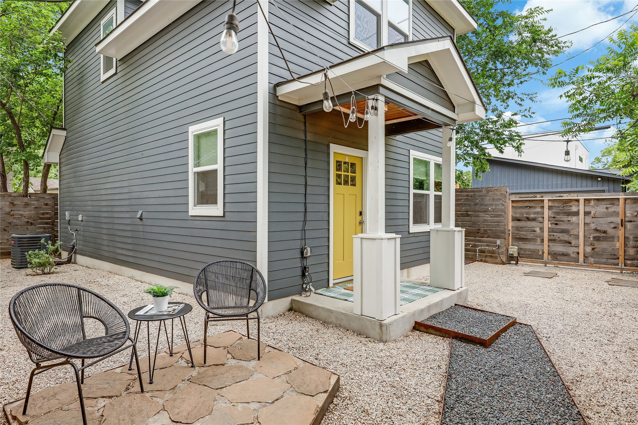 5512 Duval Street, Unit 2 Austin, TX 78751 - Photo 5 of 39 a view of house with backyard outdoor seating and barbeque oven