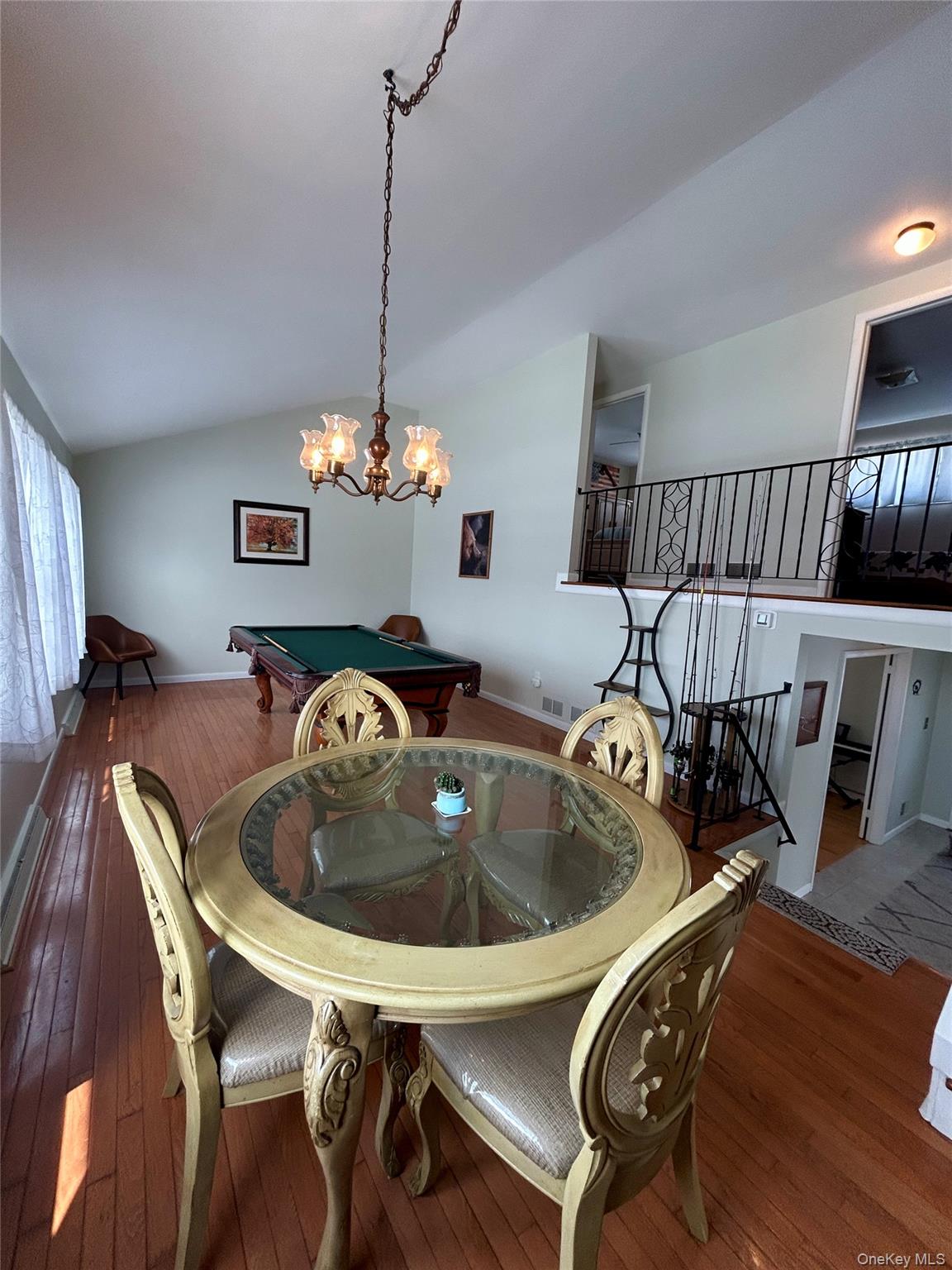 5 Sheldon Drive Cornwall, NY 12518 - Photo 13 of 30 a living room with furniture and a chandelier