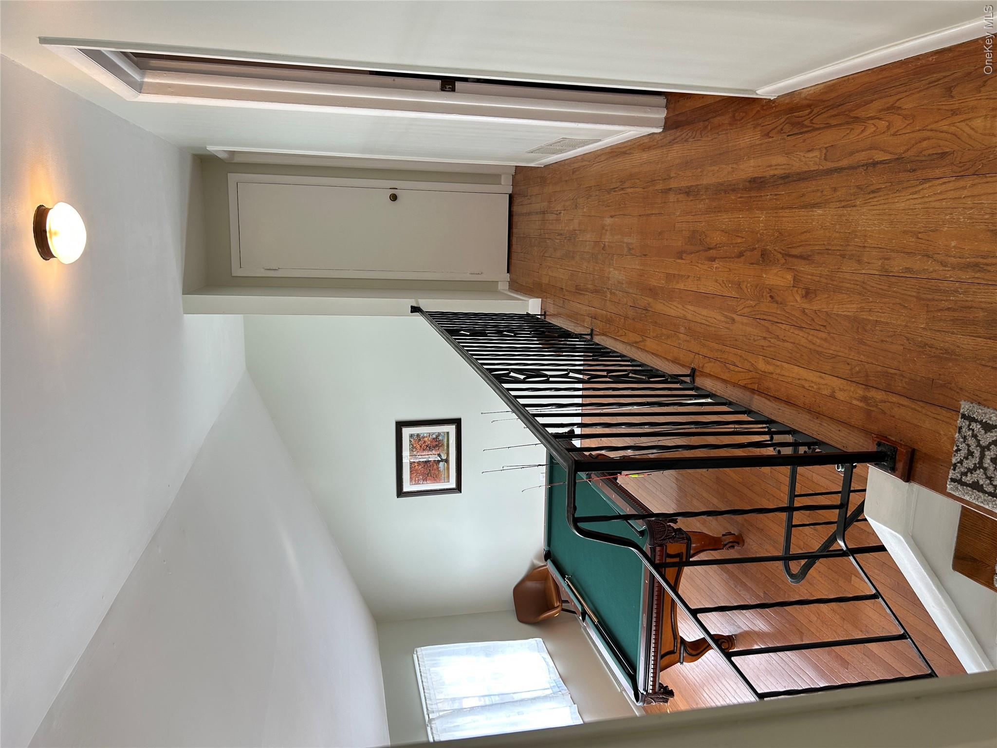 5 Sheldon Drive Cornwall, NY 12518 - Photo 17 of 30 a view of a hallway with wooden floor and stairs