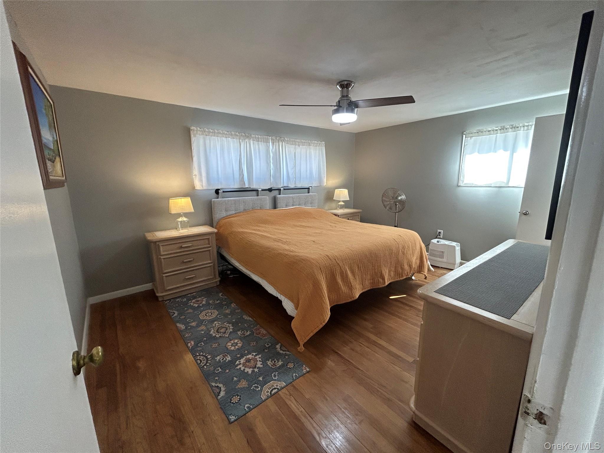 5 Sheldon Drive Cornwall, NY 12518 - Photo 18 of 30 a bedroom with a bed and a mirror