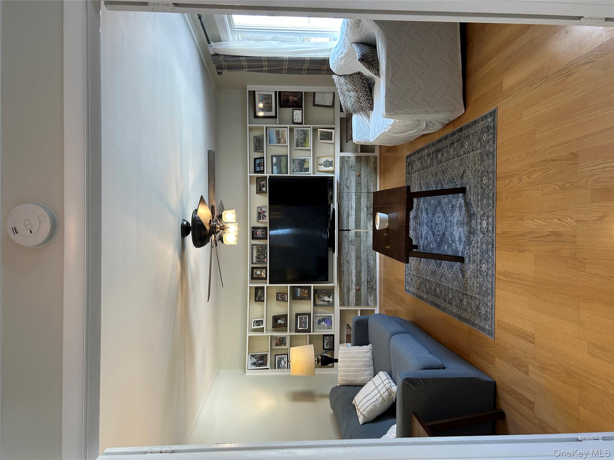 5 Sheldon Drive Cornwall, NY 12518 - Photo 5 of 30 a living room with furniture and a flat screen tv