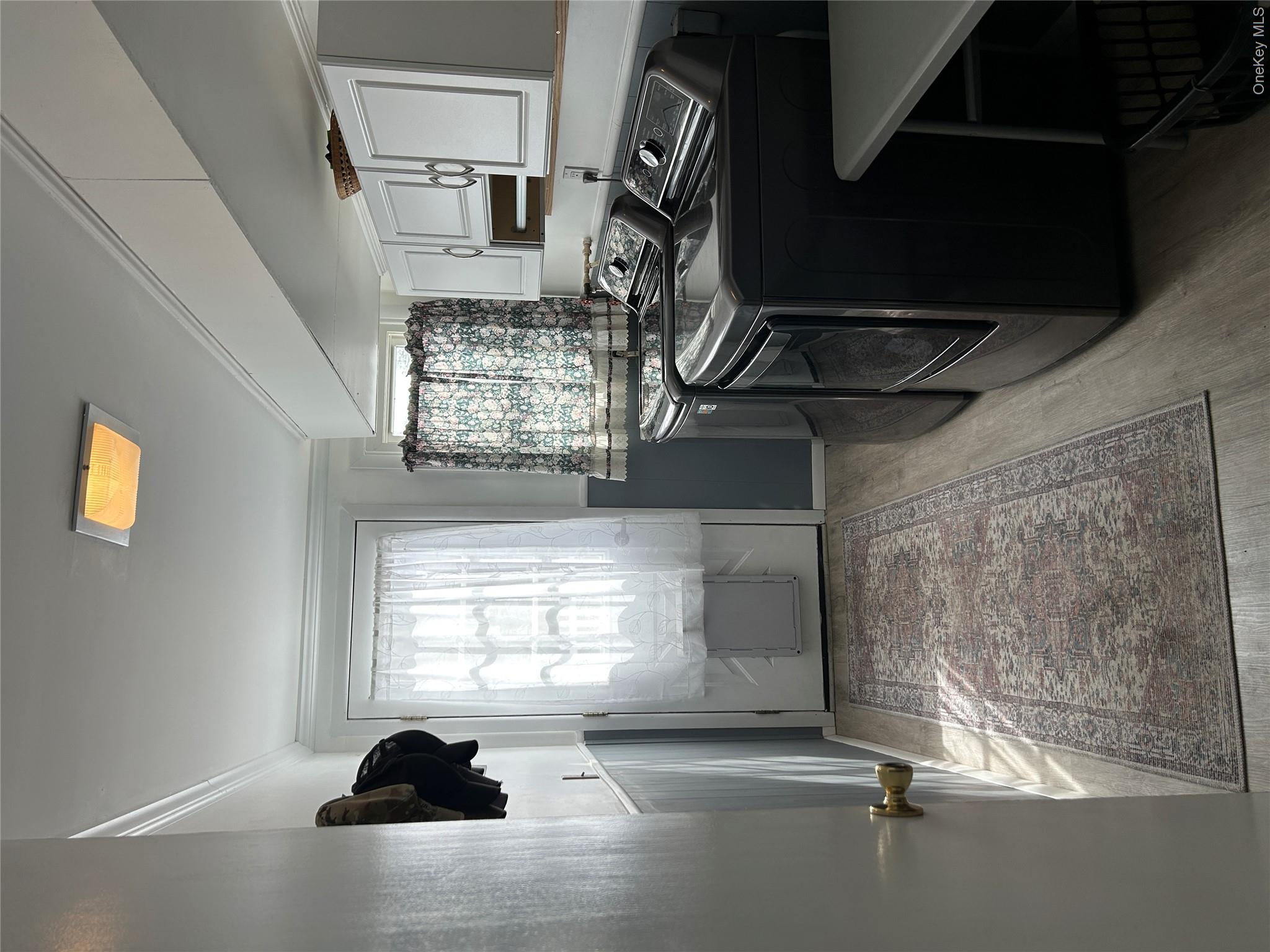 5 Sheldon Drive Cornwall, NY 12518 - Photo 7 of 30 a kitchen with a stove a sink and a microwave