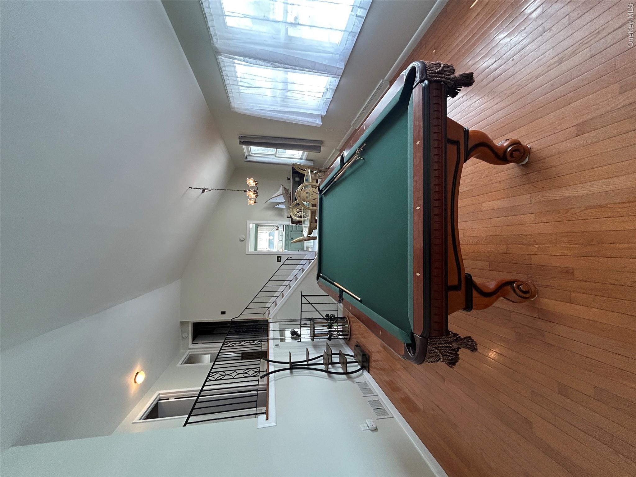 5 Sheldon Drive Cornwall, NY 12518 - Photo 9 of 30 a room with pool table windows and wooden floor