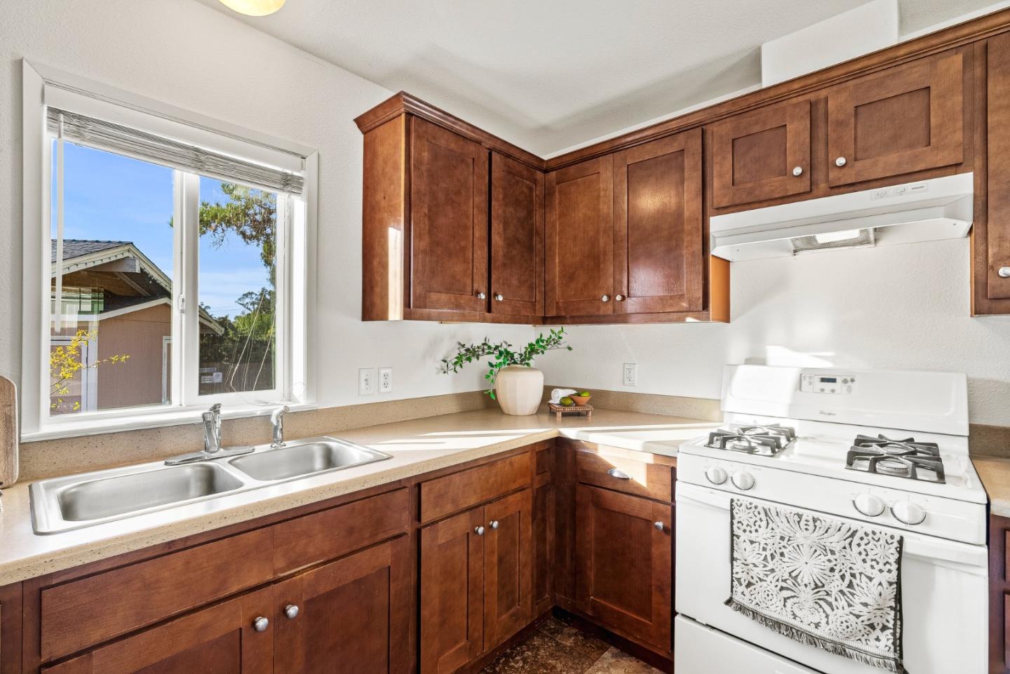 100 North Rodeo Gulch Road, Unit 1 Soquel, CA 95073 - Photo 12 of 20 a kitchen with a sink cabinets and window