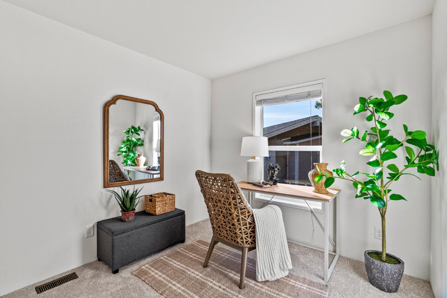 100 North Rodeo Gulch Road, Unit 1 Soquel, CA 95073 - Photo 13 of 20 a living room with furniture a potted plant and a fireplace