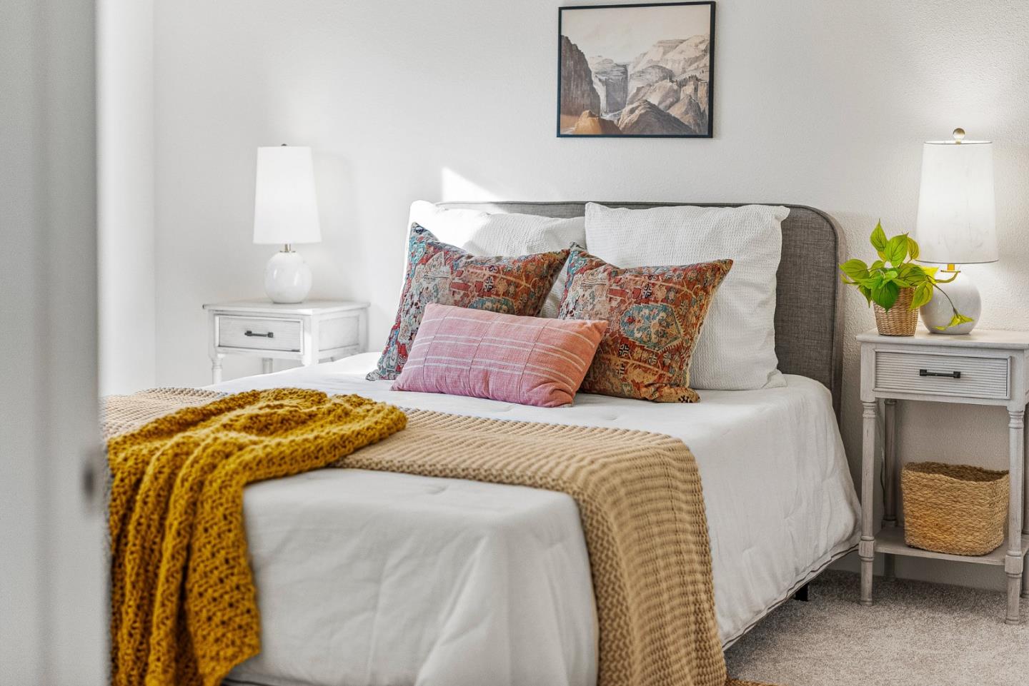 100 North Rodeo Gulch Road, Unit 1 Soquel, CA 95073 - Photo 16 of 20 a bedroom with a bed and a painting on the wall