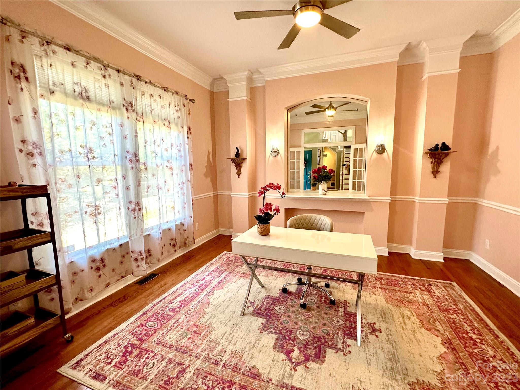 7112 Michael Scott Crossing Fort Mill, SC 29708 - Photo 6 of 48 a living room with a rug and wooden floor