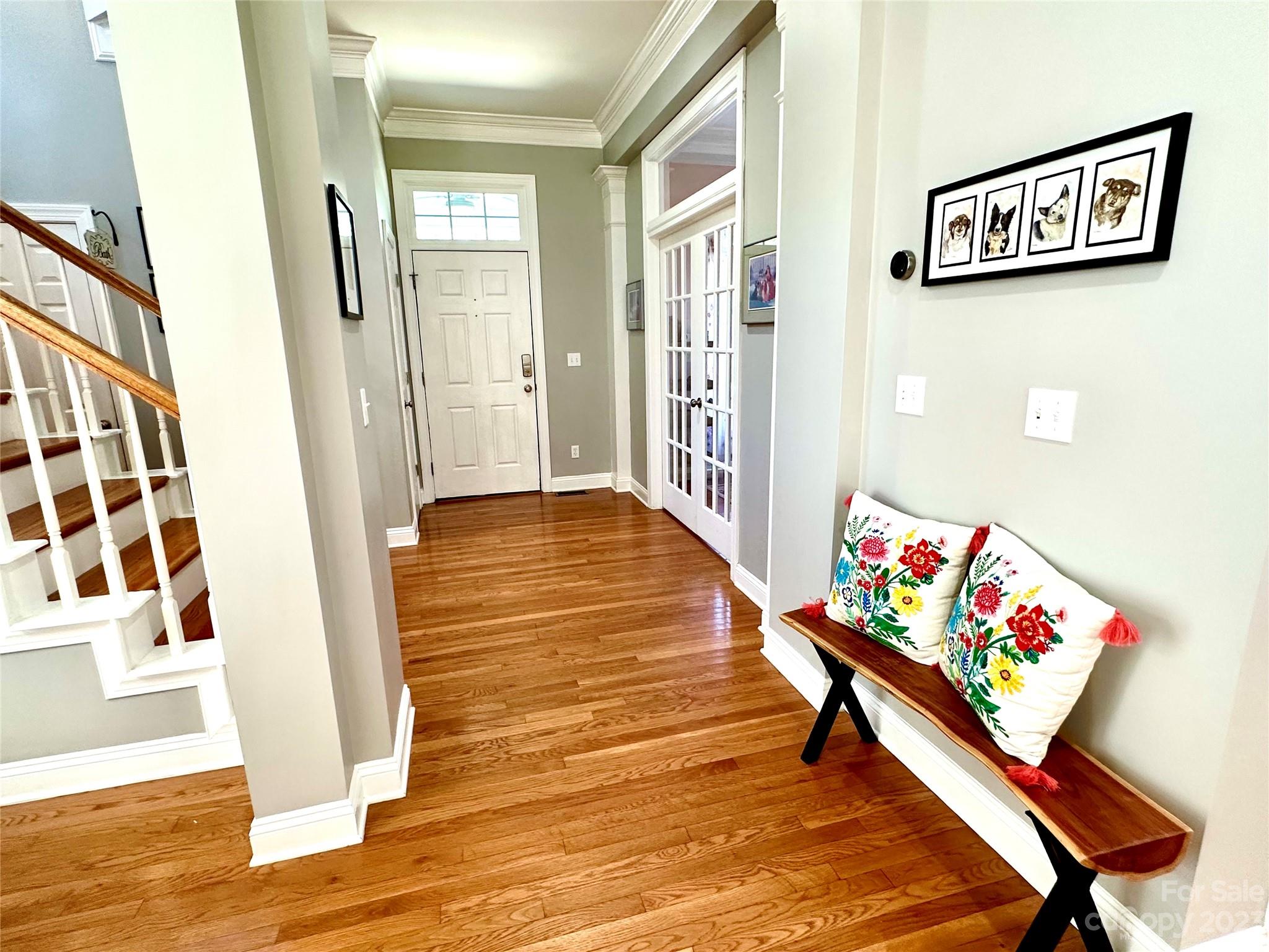 7112 Michael Scott Crossing Fort Mill, SC 29708 - Photo 7 of 48 a hallway with toys and wooden floor