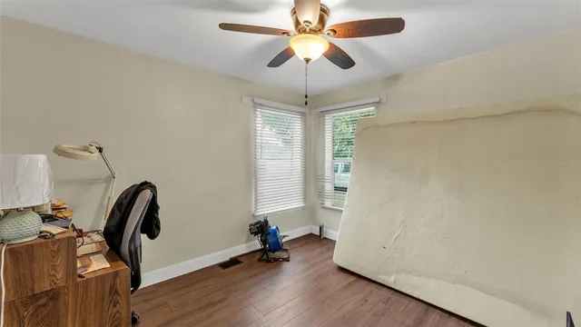 a view of room with a window and gym cycle