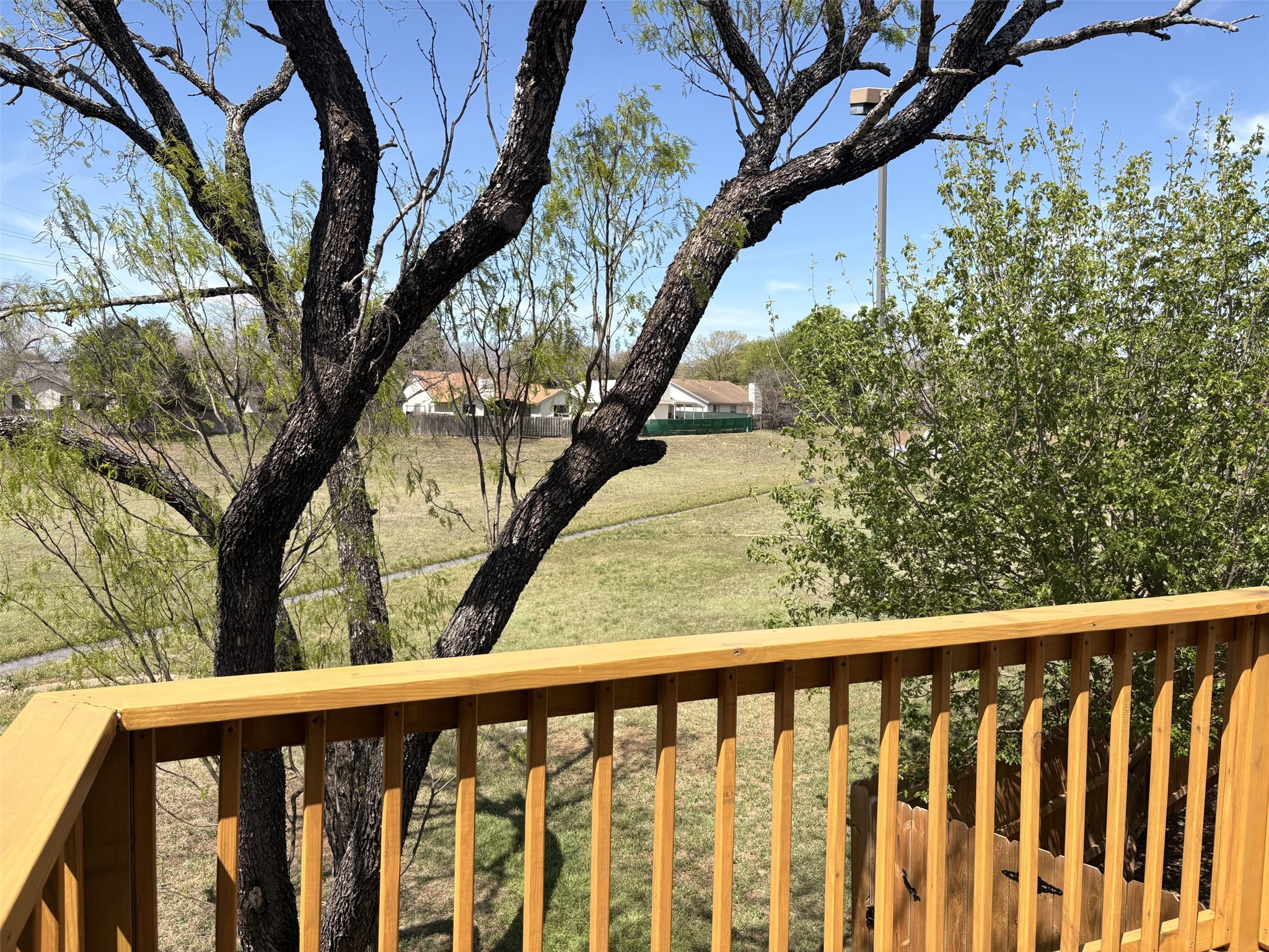 9902 Roxanna Drive, Unit D Austin, TX 78748 - Photo 12 of 19 Wooden terrace