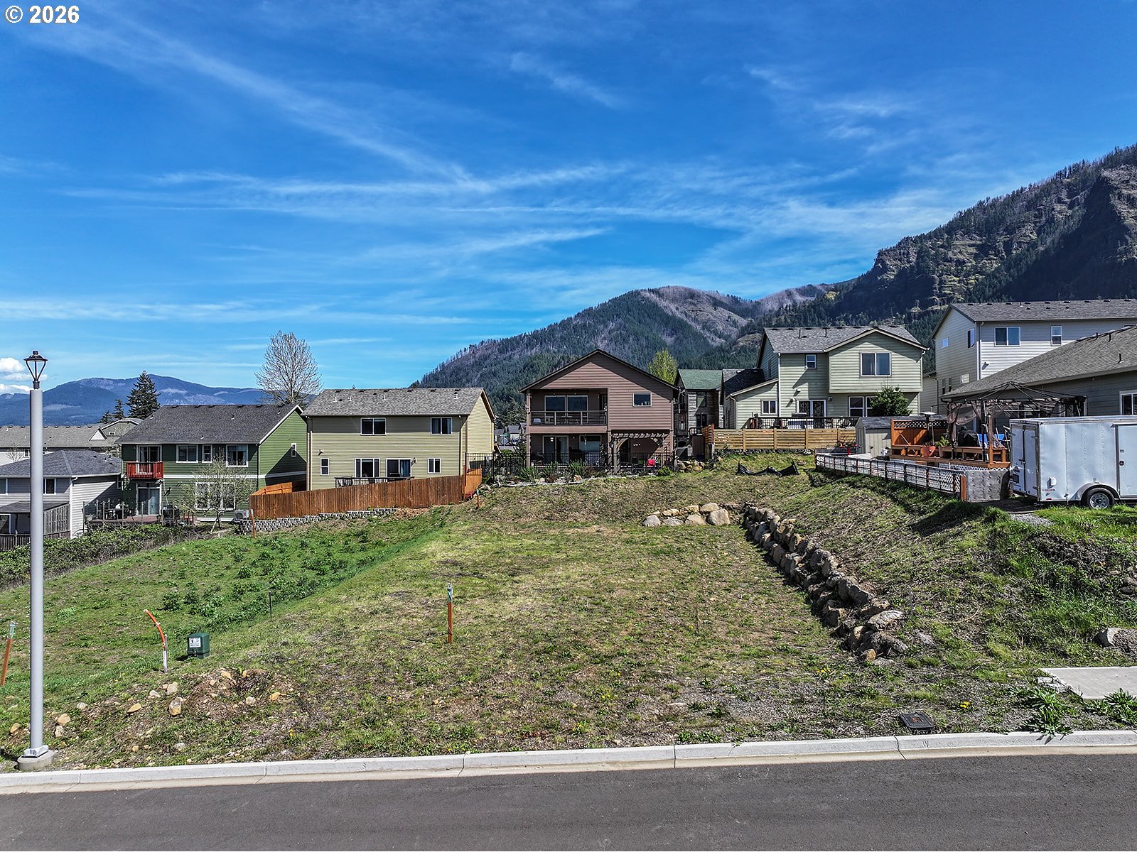 Manchester Drive Cascade Locks, OR 97014 - Photo 3 of 12 a house view with a garden space
