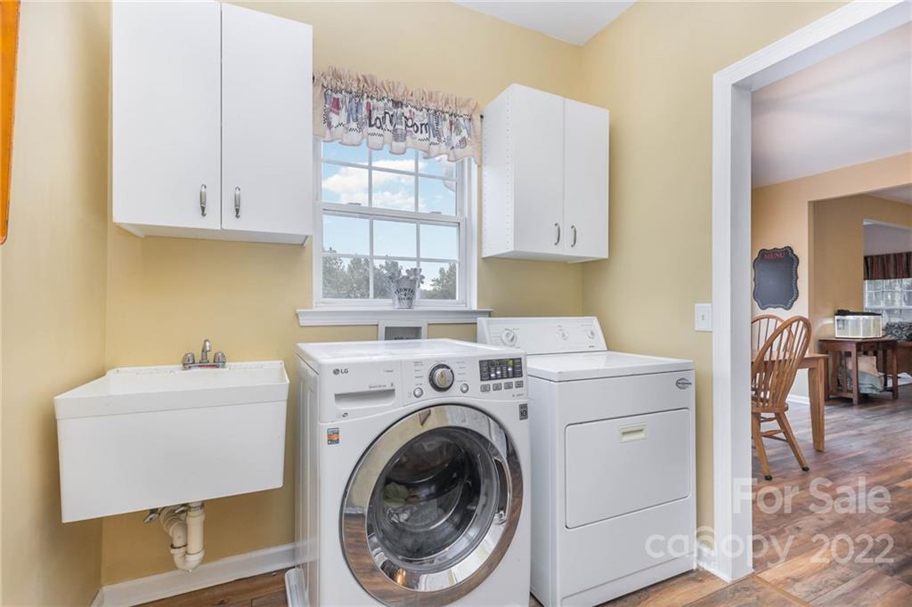 154 Coronilla Road Mooresville, NC 28117 - Photo 17 of 38 a utility room with dryer and washer