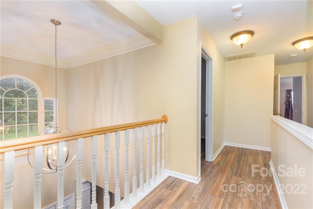 154 Coronilla Road Mooresville, NC 28117 - Photo 19 of 38 a view of entryway with wooden floor