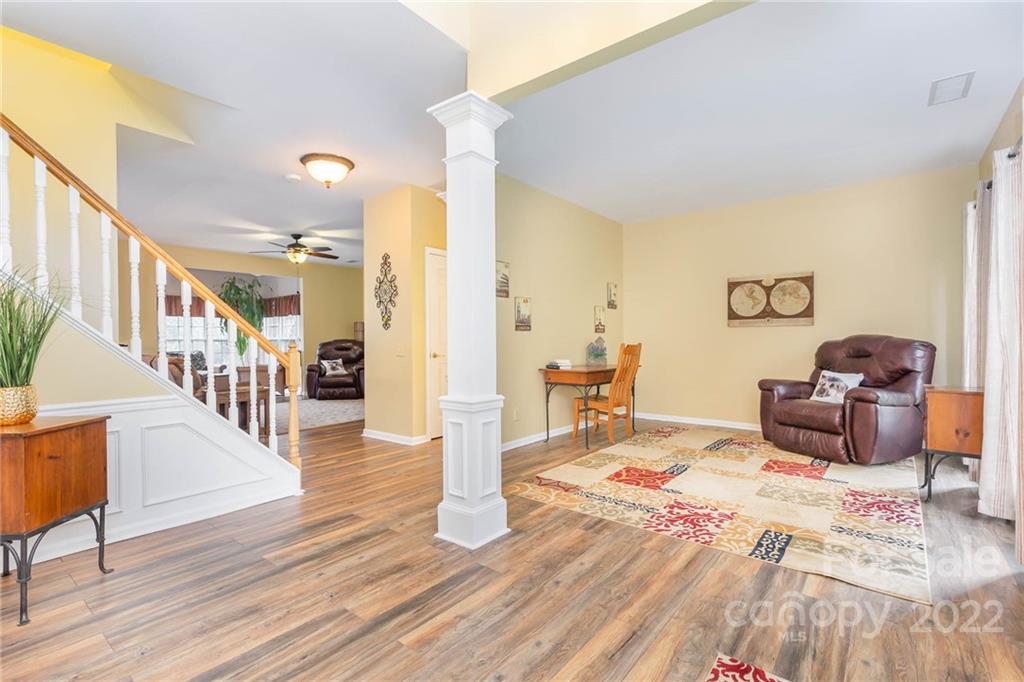 154 Coronilla Road Mooresville, NC 28117 - Photo 2 of 38 a living room with furniture and wooden floor