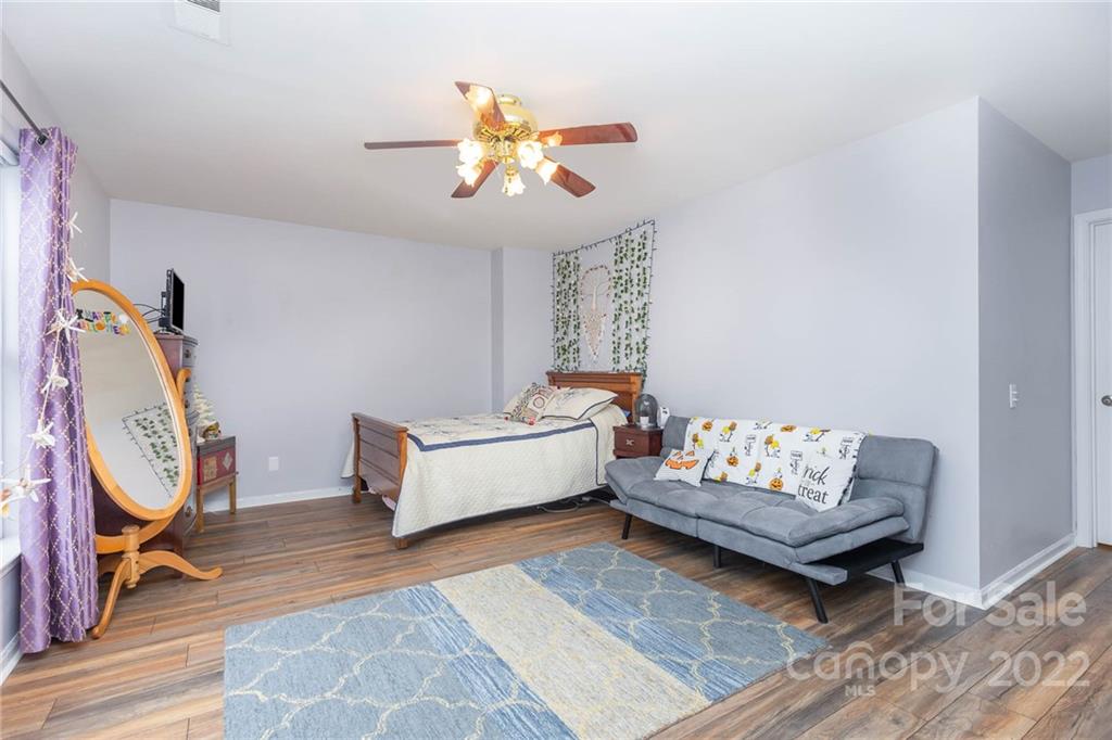 154 Coronilla Road Mooresville, NC 28117 - Photo 28 of 38 a living room with furniture and furniture