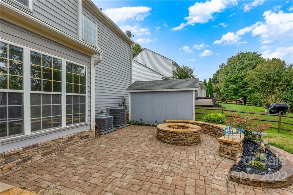 154 Coronilla Road Mooresville, NC 28117 - Photo 33 of 38 a house view with a backyard space