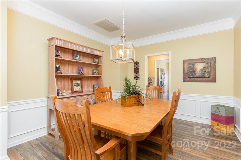 154 Coronilla Road Mooresville, NC 28117 - Photo 6 of 38 a view of a dining room with furniture