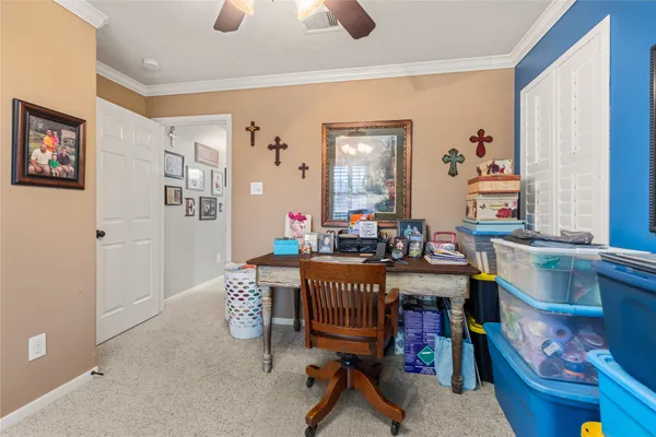 a view of a workspace with furniture