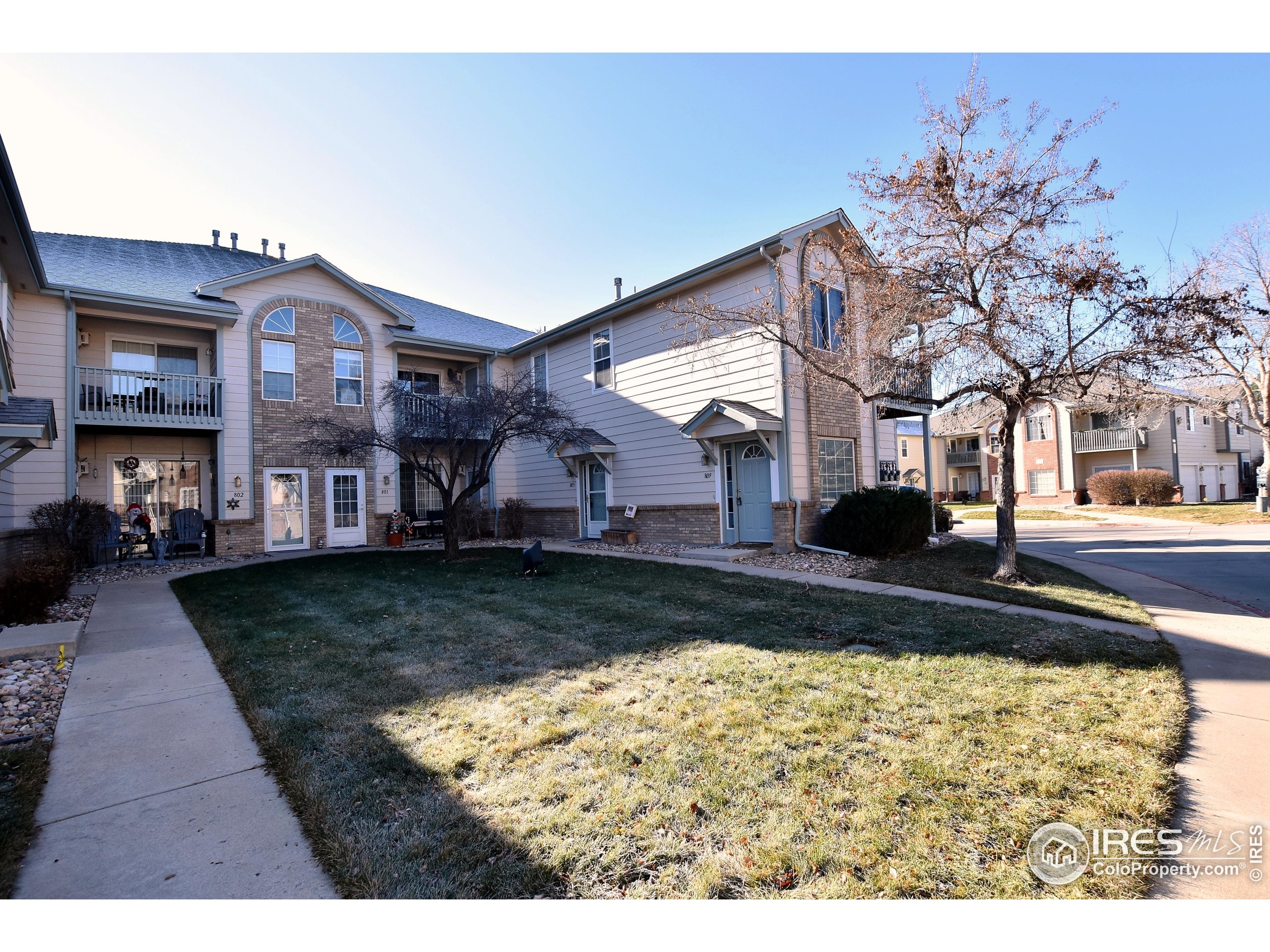 5151 West 29th Street Greeley, CO 80634 - Photo 1 of 40 a front view of a house with garden