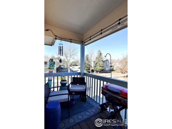a outdoor living space with furniture and a potted plant