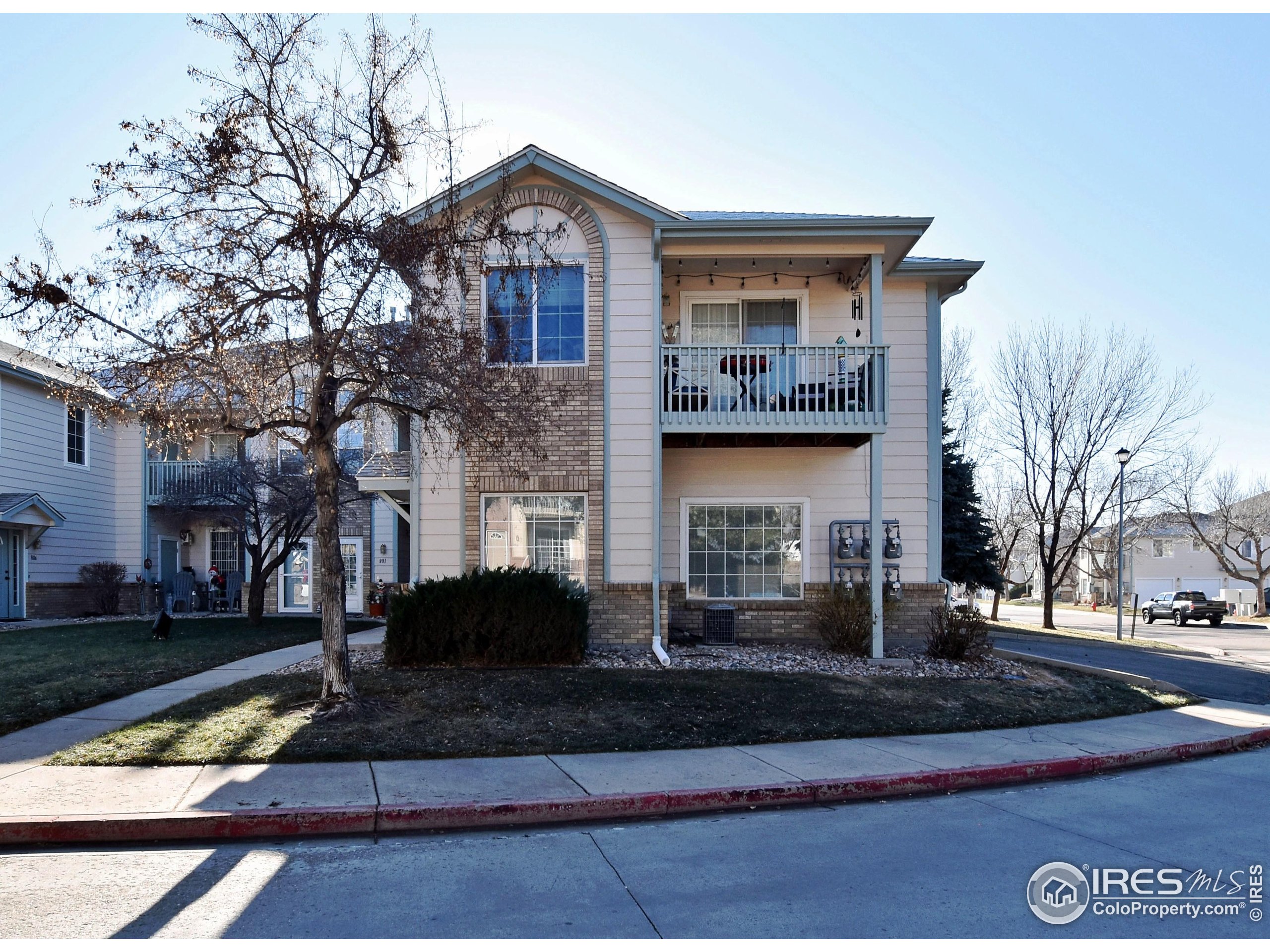 5151 West 29th Street Greeley, CO 80634 - Photo 30 of 40 a front view of a house with a yard